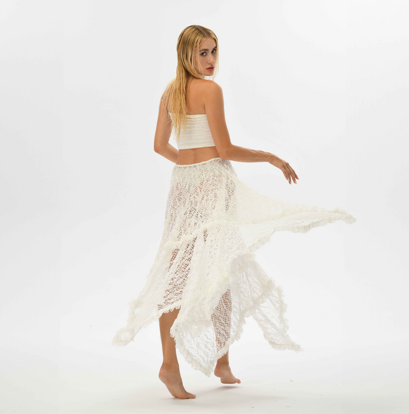 White boho lace skirt with a flowy layered cut, featuring an elastic waist, perfect for beachwear, casual outfits, or as a top.