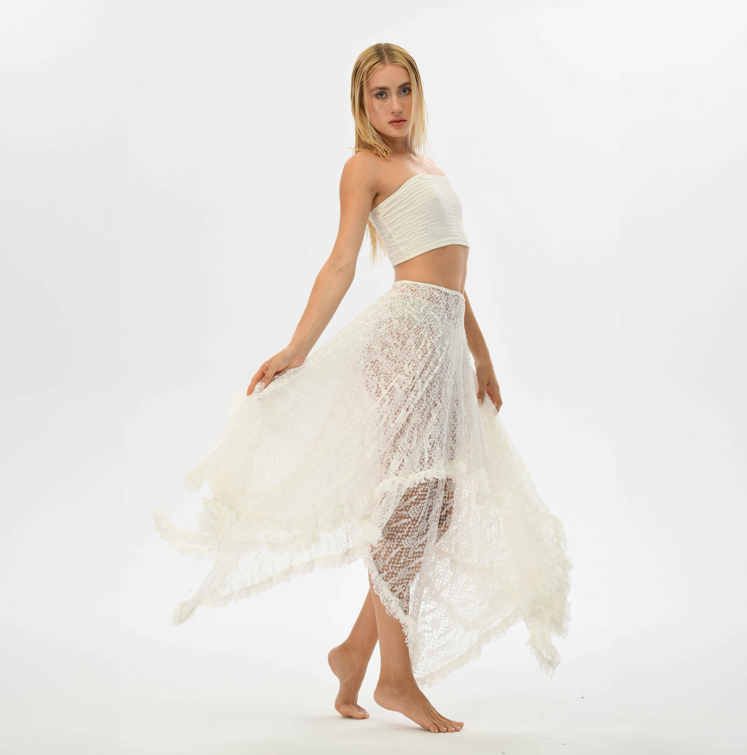 Boho chic lace skirt in white, made from recycled polyester with a flowy, layered design, perfect for beach cover-ups or casual wear.