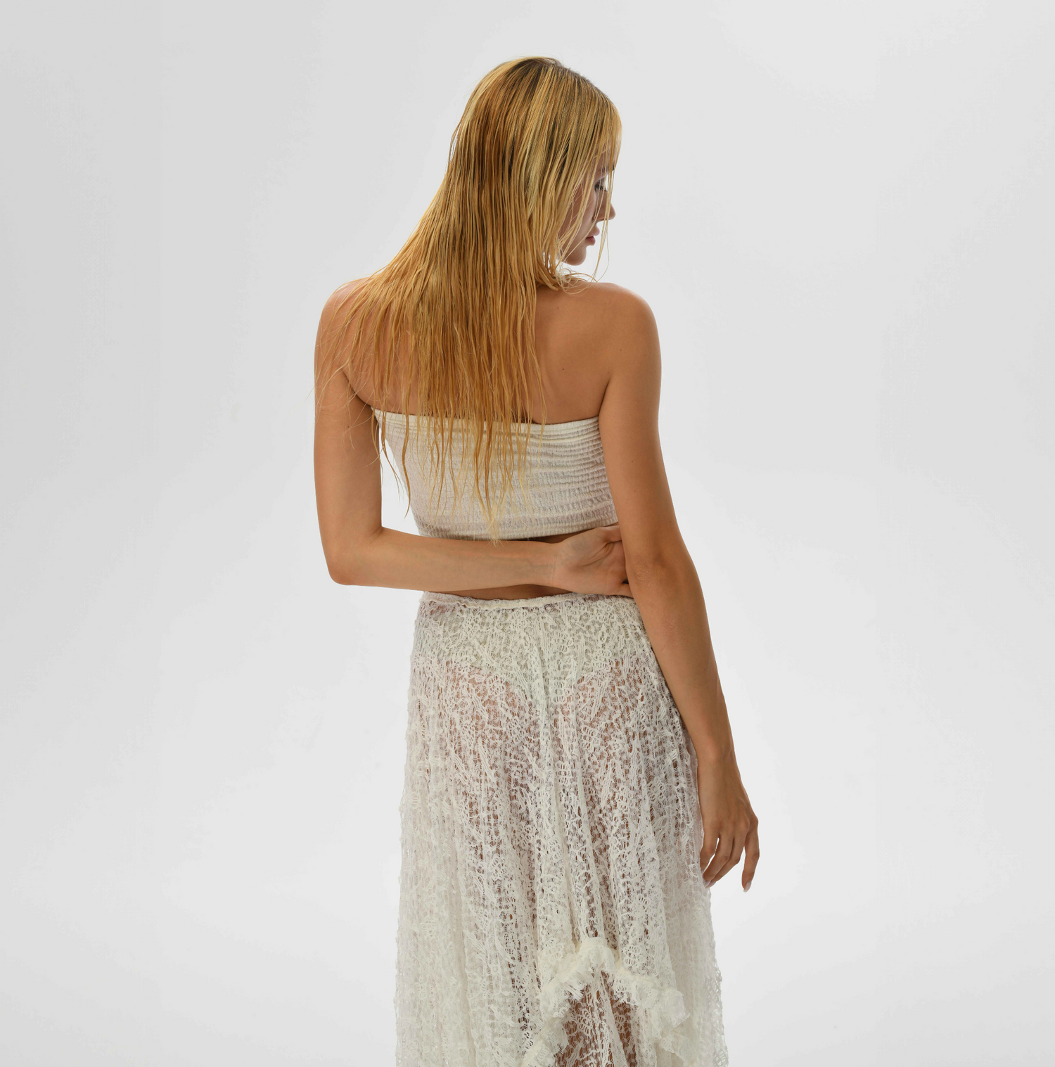 White boho lace skirt for women, featuring a flowy layered cut and elastic waist, perfect for resort wear or daily bohemian outfits.