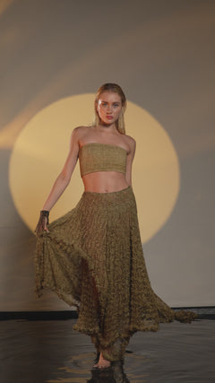 Boho resort skirt in desert sand, made from recycled polyester lace with a see-through design, ideal for beach or casual wear.