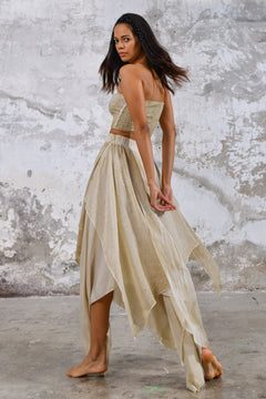 Bohemian maxi skirt made from organic cotton Flowy and asymmetric skirt for a free-spirited look Sustainable and eco-friendly clothing for conscious shoppers Rustic and earthy colors perfect for fall and winter Handmade embroidery and detailing for a unique touch Easy care organic cotton material for hassle-free washing and drying Size-inclusive boho clothing for all body types Casual or dressy maxi skirt for any occasion Perfect skirt for outdoor music festivals or beach weddings