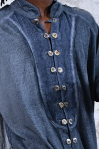 Blue boho men's shirt with alchemy and warrior designs, unique spiritual men's shirt made from soft cotton fabric, conscious clothing for men featuring cruelty-free materials, handcrafted bohemian-style men's shirt with chakra symbols, sustainable men's fashion, men's alchemist warrior shirt with chakra-inspired designs, mindful men's shirt made with eco-friendly materials, comfortable and stylish men's shirt with a spiritual touch, ethical and sustainable men's clothing with unique designs.