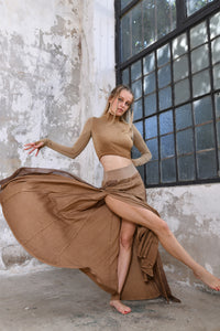 sexy and dramatic split design, high-quality rayon fabric, comfortable elastic waistband, range of colors, one size fits most, effortlessly chic bohemian style, summer festivals, beach parties, versatile dress up or down style, boho goddess skirt, grecian goddess skirt, bohemian style